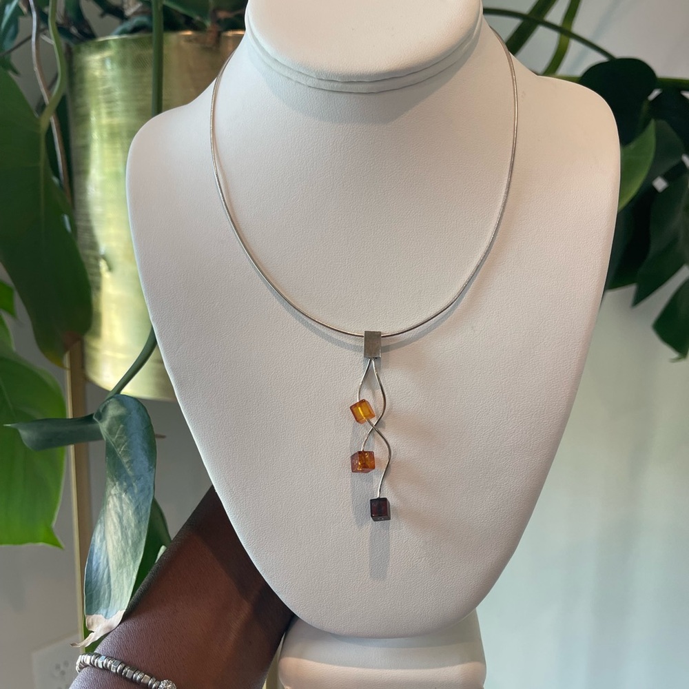 Elegant Silver Necklace with Amber Accents